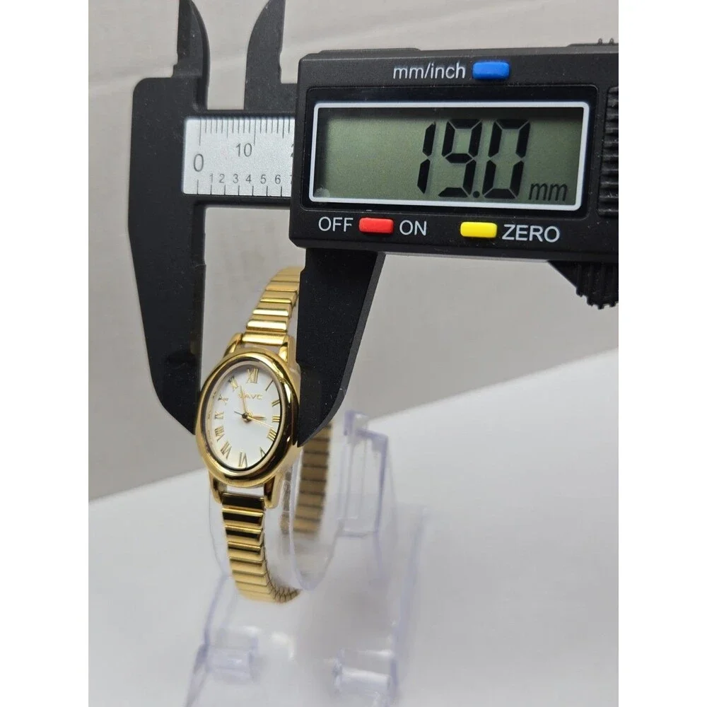 VAVC Womens Goldtone Oval Roman Numeral Expansion Quartz Dress Watch New Battery